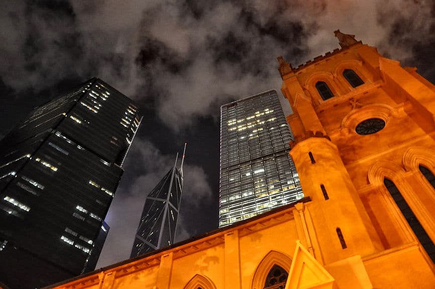 tall church and skyscrapers