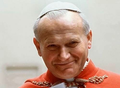 a happy, smiling Pope St. John Paul II