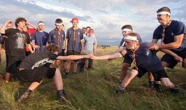 scouts playing a game of strength and endurance