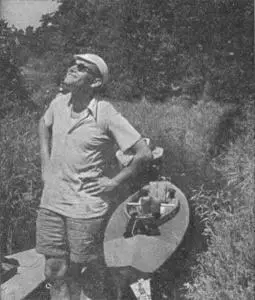 the future St. John Paul II with a kayak behind him