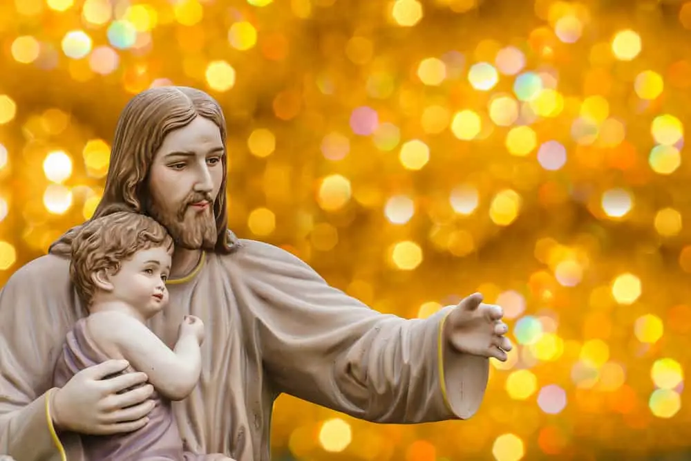 Statue of Jesus holding a little child