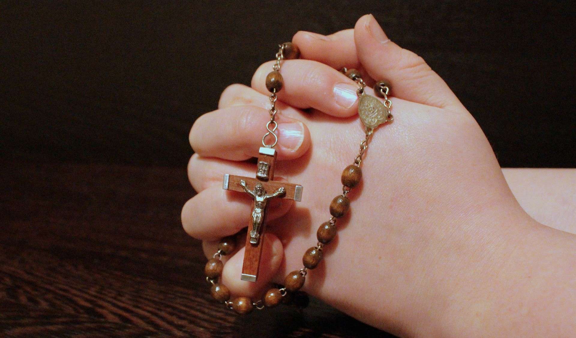Hands with a rosary