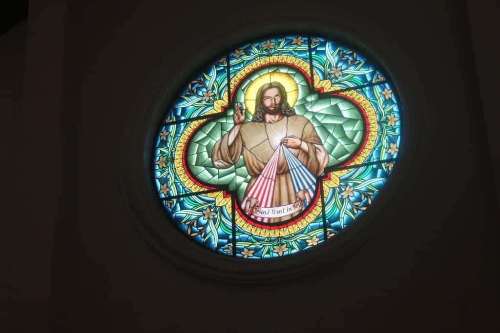 stained glass window of Divine Mercy image