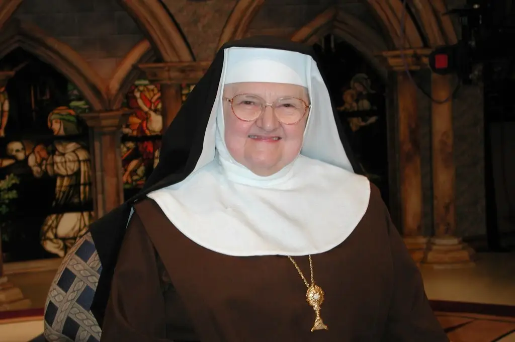 Mother Angelica smiling in her Poor Clare habit