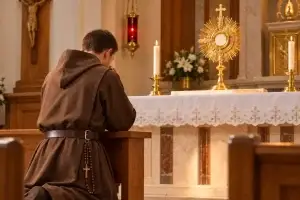 A Knight of the Holy Eucharist praying before the Blessed Sacrament